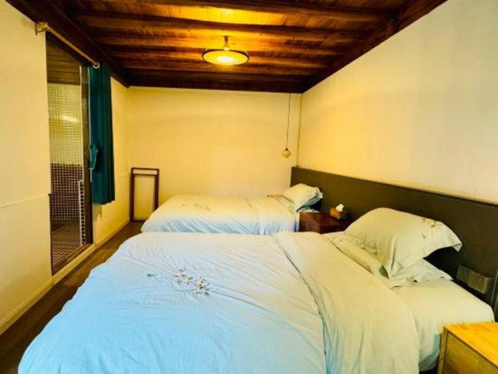 Lijiang Baisha Holiday Resort エクステリア 写真