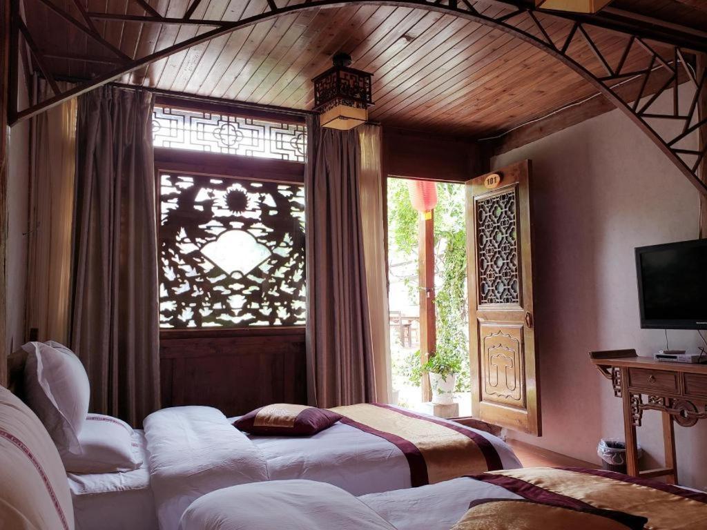 Lijiang Baisha Holiday Resort エクステリア 写真