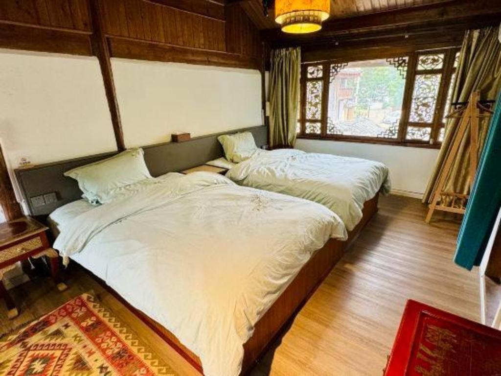 Lijiang Baisha Holiday Resort エクステリア 写真