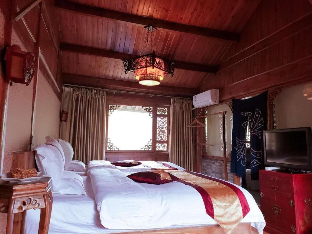 Lijiang Baisha Holiday Resort エクステリア 写真